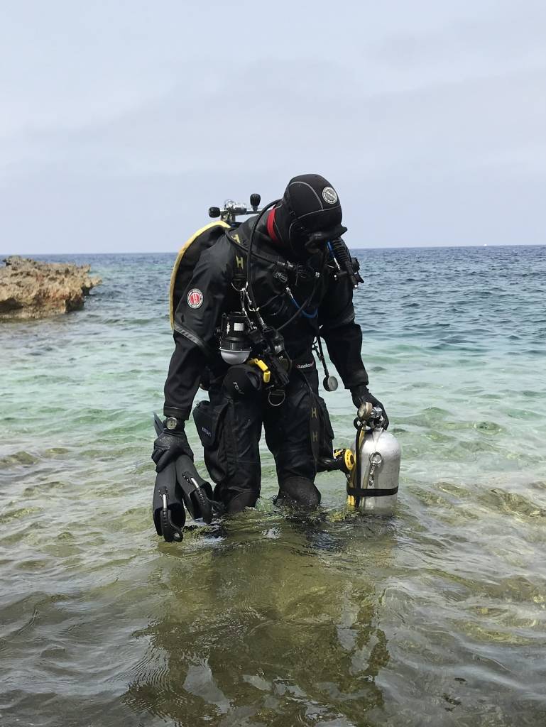 Deco diver entering the water